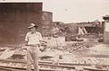 No 77 Squadron Association Kittyhawks and Mustangs in the Pacific photo gallery - Balikpapan - Frank Lees in front of oil installation (Frank Lees)